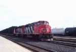 CN GP40-2LW #9454 leads a veteran SD40-2W with train #395